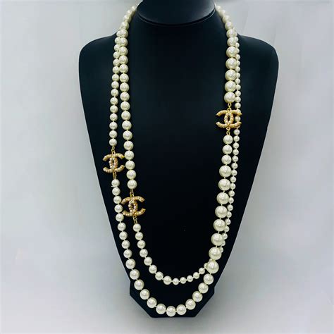 chanel long pearl necklace|Chanel pearl long strand necklaces.